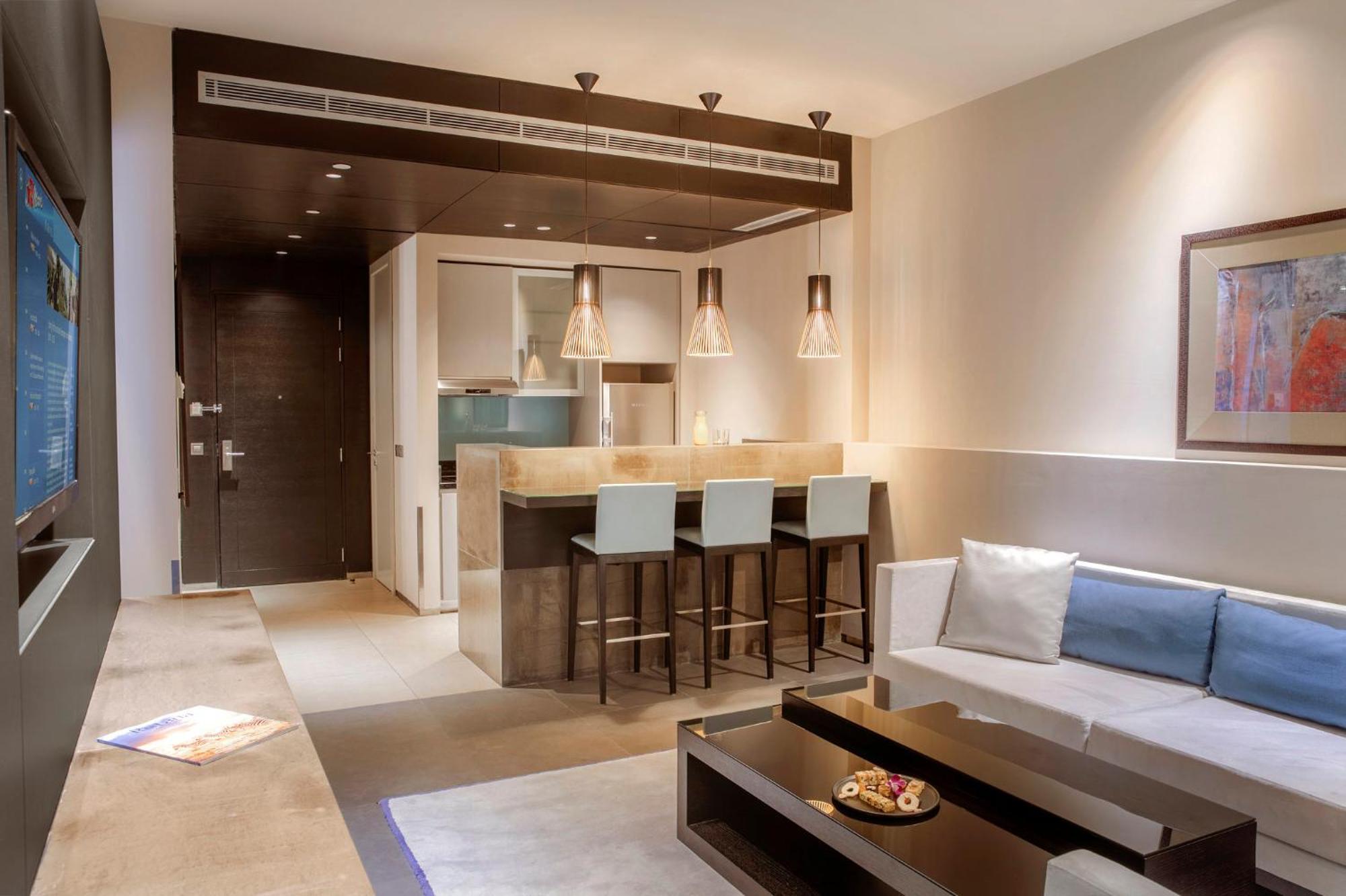 The Abdali Boulevard Hotel Амман Екстер'єр фото A living room with a kitchenette