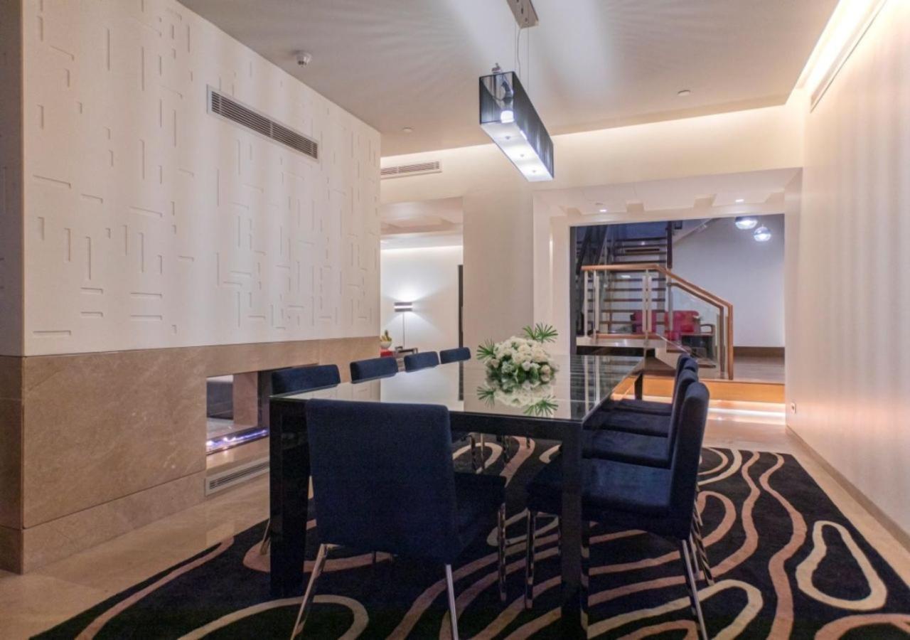 The Abdali Boulevard Hotel Амман Екстер'єр фото A modern dining room