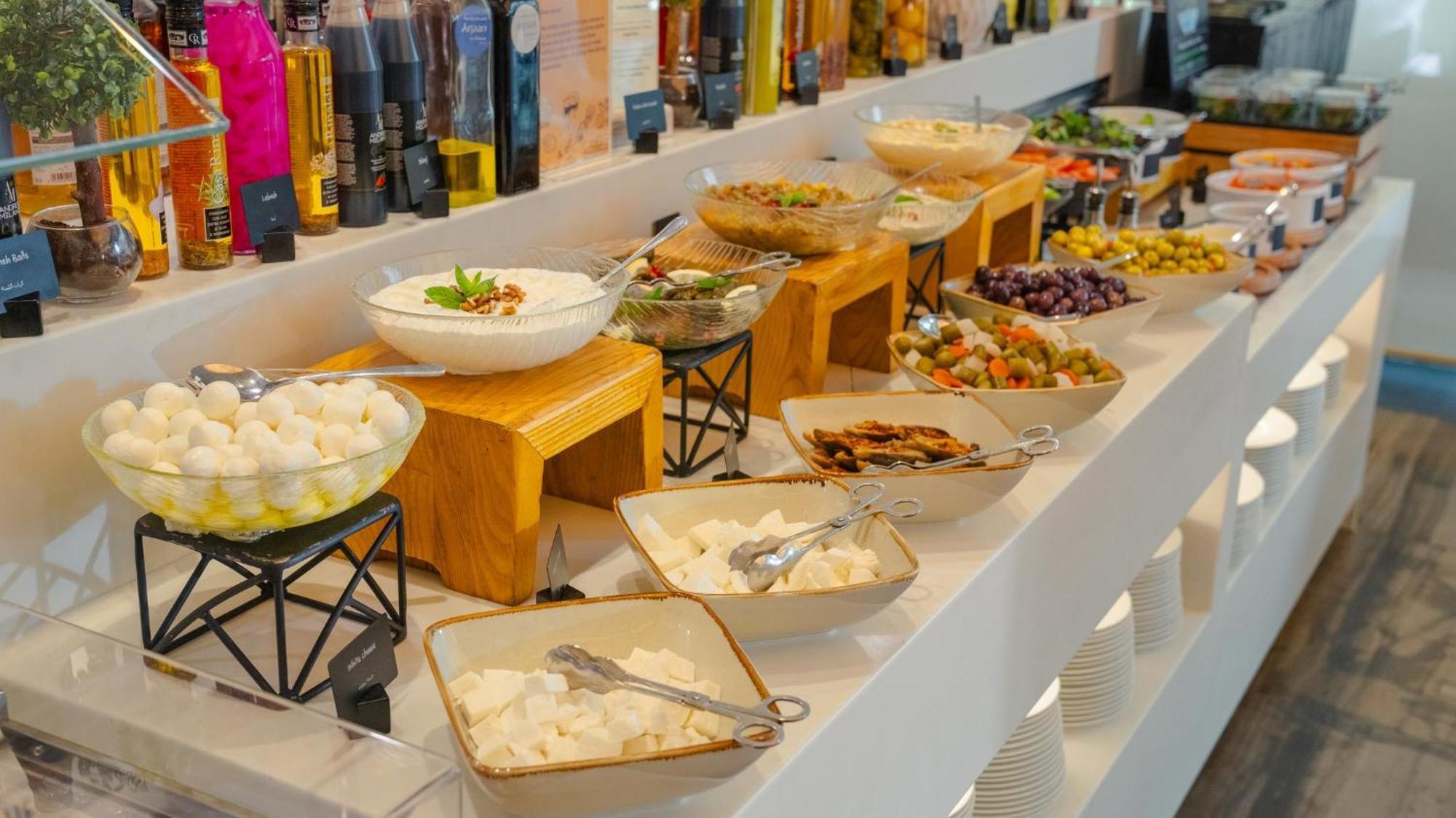 The Abdali Boulevard Hotel Амман Екстер'єр фото A selection of Greek meze